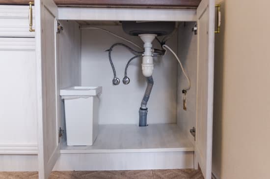 install outlet under kitchen sink